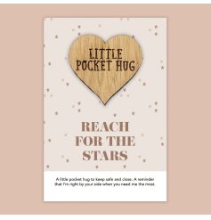 Reach for the stars! A heart shaped token attached to a pastel starry supportive card. 