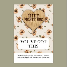 A heart shaped token with 'You've got this' text, complete with a printed sunflower gift card.