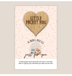 A big hug, just for you! Presented on a planet style polkadot gift card, this heart shaped token is a great gesture.