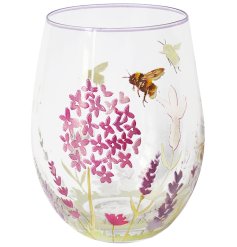 This beautiful stemless glass features a delicate lavender and bee design
