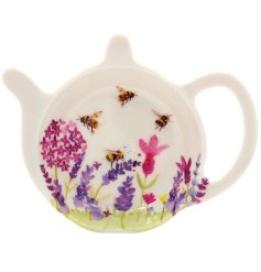 A lavender and bees tea bag tidy in a tea pot shape. 