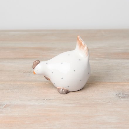 A charming, country style chicken ornament with a chic polka dot pattern. 