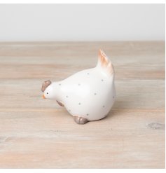 A charming, country style chicken ornament with a chic polka dot pattern. 