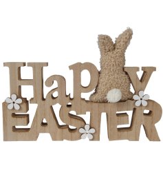 A shabby chic Happy Easter sign made from wood with a sherpa bunny