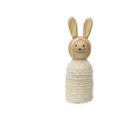 A wooden bunny decoration with a natural wool wrap and cute painted face.