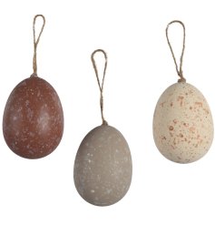 A set of 6 coloured egg decorations each hung by jute twine. 