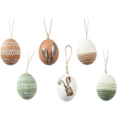 A festive box of 6 Easter decorations in the shape of eggs. Featuring different detailed patterns and images