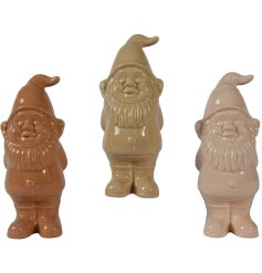3 large assorted garden gnomes in brown hues. 