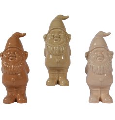 3 assorted garden gnomes in brown and neutral colour tones.