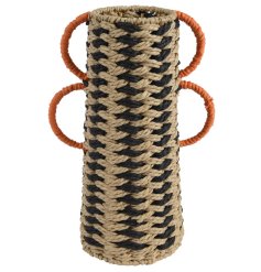 A woven paper rope vase in black, orange and neutral colours.