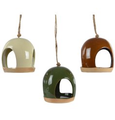 An assortment of 3 bird feeders. Richly glazed in green and brown earthy colours. Complete with rustic string hangers. 