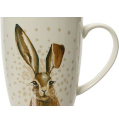 A charming porcelain mug with a cute Hare image surrounded by cream polkadots.