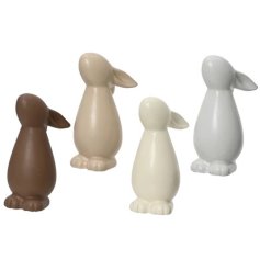 An assortment of 4 contemporary bunny ornaments with a smooth finish. In natural colours to compliment any interior. 