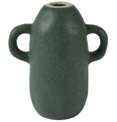 A beautifully crafted ceramic vase in a dark green earthy colour. 