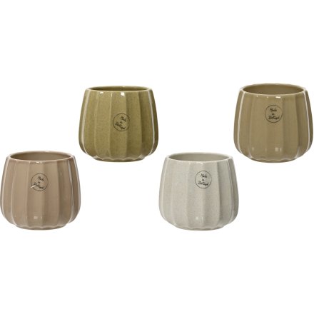 A mix of 4 ribbed planters in earthy tones. Each has a ribbed design and subtle speckled finish. Perfect for house plant