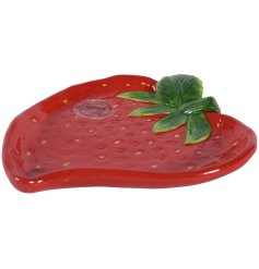 Thi Strawberry Plate adds fun and sweetness to the kitchen. 