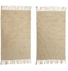 This unique cotton rug with tufted abstract design is the perfect addition to any modern home.
