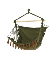 A natural green hammock swings with brown tassels and a wooden bar. 