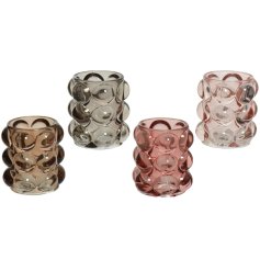 A lovely assortment of 4 bubble style tea light holders in neutral and pink colours.