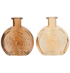 An assortment of 2 luxurious glass vases in rich honey and gold colours. Each has a ribbed circular pattern