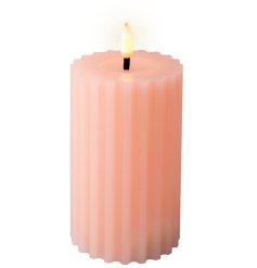 This pink LED carved candle is perfect for a romantic setting with its realistic flickering flame and delicate design.