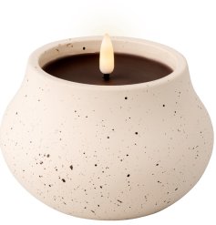 Create a cosy atmosphere in an outdoor space with this cream LED outdoor speckled candle.