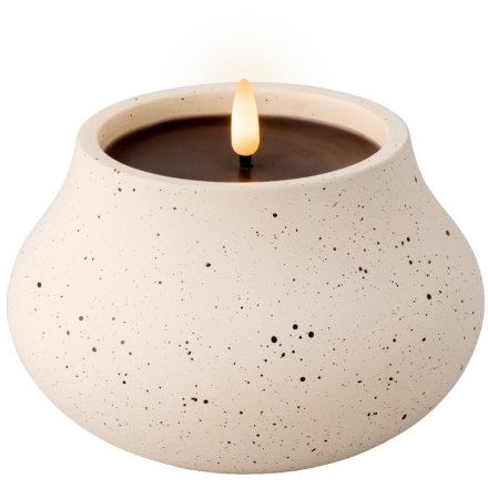 A cream speckled outdoor LED candle with a warm white effect when on. It comes in a speckled design. 