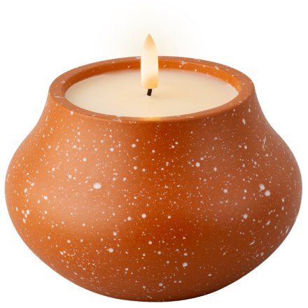 A burnt orange outdoor LED candle with white speckles, perfect for keeping it cosy in the evenings outside. 
