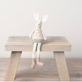 A charming white rabbit decoration with vintage inspired clothes. A chic gift item and seasonal decoration. 