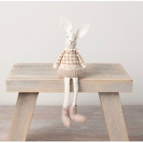 A charming fabric bunny with knitted, felt and fabric features. 