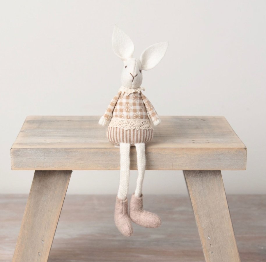 A charming fabric bunny with knitted, felt and fabric features. 