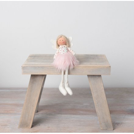 A charming angel decoration. Crafted with a vintage style ditsy floral fabric and faux fur skirt.