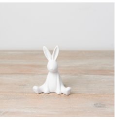 A contemporary sitting bunny ornament with a subtle textured surface.
