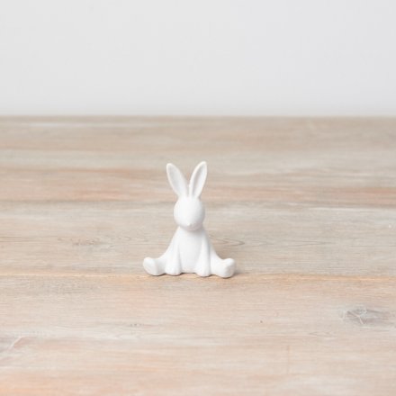 A chic sitting bunny ornament in white. Beautifully textured with cute and contemporary features.