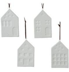 An assortment of 4 chic hanging porcelain house decorations.