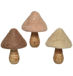 Add a touch of whimsy to the home with these Wooden Mushroom Ornaments with Wool Top and Glitters Finish