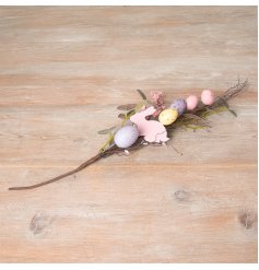 A beautifully detailed artificial floral sprig with pastel coloured speckled eggs and a wooden bunny detail. 