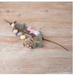 A beautifully detailed artificial floral sprig with pastel coloured speckled eggs and a wooden bunny detail. 