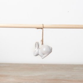 An on trend, chic ceramic bunny ornament with a natural reactive glaze. Complete with rustic jute string hanger.