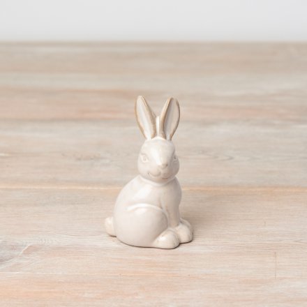 A rustic bunny ornament with a reactive glaze natural finish. A stylish gift item and interior accessory. 