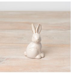 A rustic bunny ornament with a reactive glaze natural finish. A stylish gift item and interior accessory. 