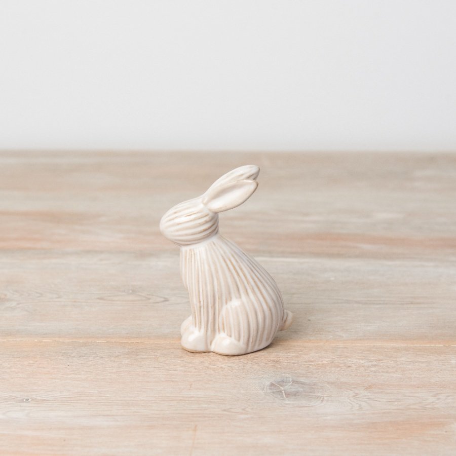 A chic and contemporary bunny ornament with a two-tone ribbed finish.