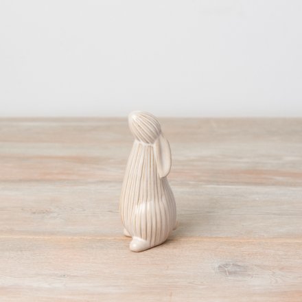 An elegant standing bunny decoration in neutral colours. Beautifully glazed and finished with a ribbed surface.