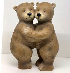 This charming Billy & Bonnie Bear Hugging resin ornament is the perfect way to add a touch of warmth and love to your ho