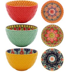 A vibrant assortment of three bowls. The perfect assortment of bowls for snacks and nibbles when entertaining at home.