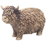 This Hughie Highland Cow ornament is the perfect addition to any shelf or mantel piece.