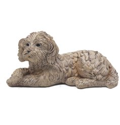 Adorable resin dog laid with it's paws crossed.