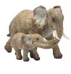 A mother elephant and her calf standing side by side, trunks entwined