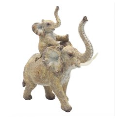 Crafted from high-quality resin, this exquisite piece features a proud elephant and her calf riding on her back