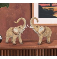 This charming Elephants with trunk ornament is a unique and beautiful decoration for any home.
